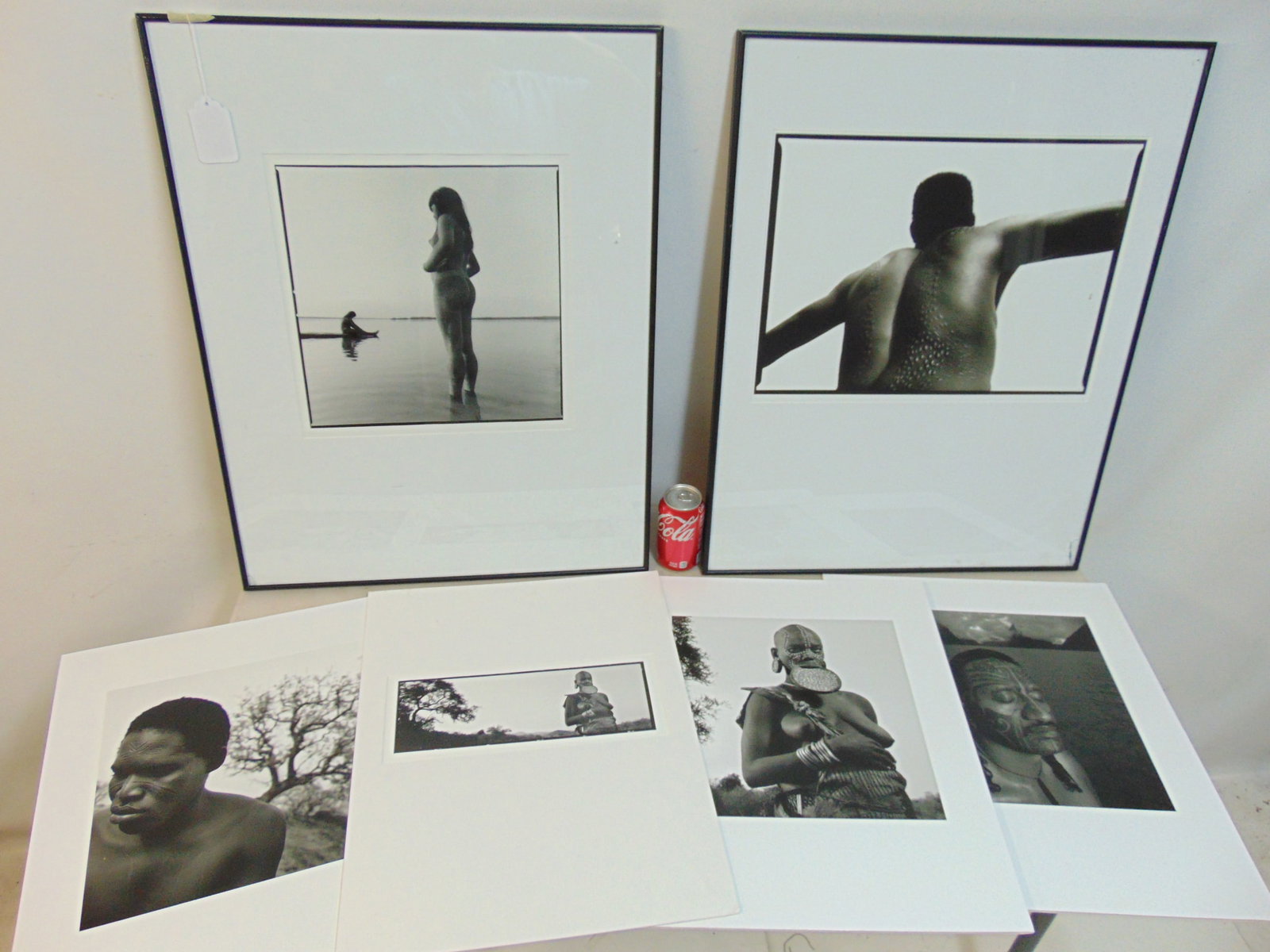 6 photographs (Iris Prints), portraits of indigenous people, two are framed, by Chris Rainier,: Lot 6 photographs (Iris Prints), various portraits of indigenous people, two are framed, by Chris Rainier, "Mursi Tribal Woman, Ethiopia", others, 19 5/8" by 16 5/8" (frames are 28.25" by 22.25" glass