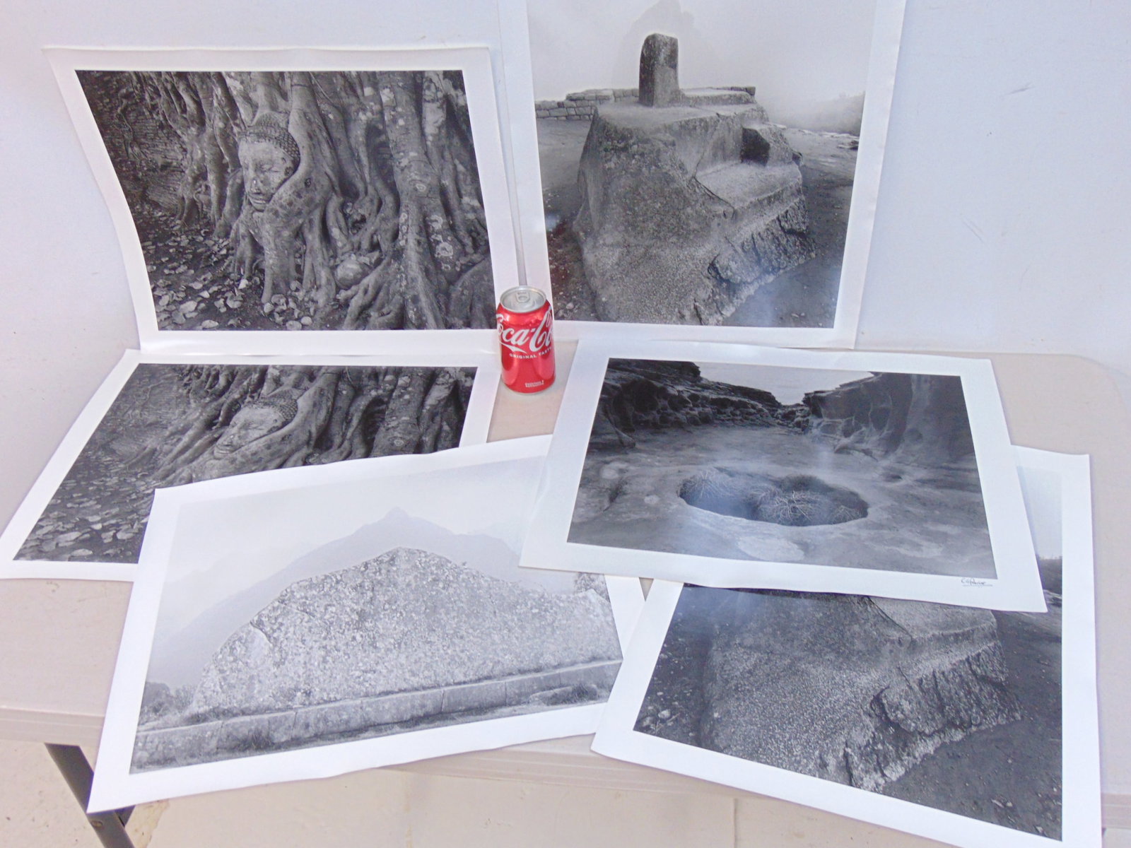 6 large photographs, Chris Rainier, "Tumbleweed and Ravine, Utah, USA" (signed), plus two doubles "S: 6 large photographs (Iris Prints), Chris Rainier, "Tumbleweed and Ravine, Utah, USA" (signed), plus two doubles "Sacred Roots" & "Intihuatana Stone" plus mountain scene, Sacred Rock, Peru, all photos 
