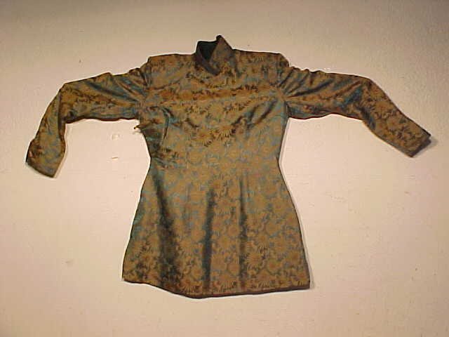 Vintage silk Chinese jacket: Silk Chinese jacket, green with gold flowers. Note, all clothing is vintage and has varying degrees of stains, wear & tears or other damage, all clothing articles are offered as is.