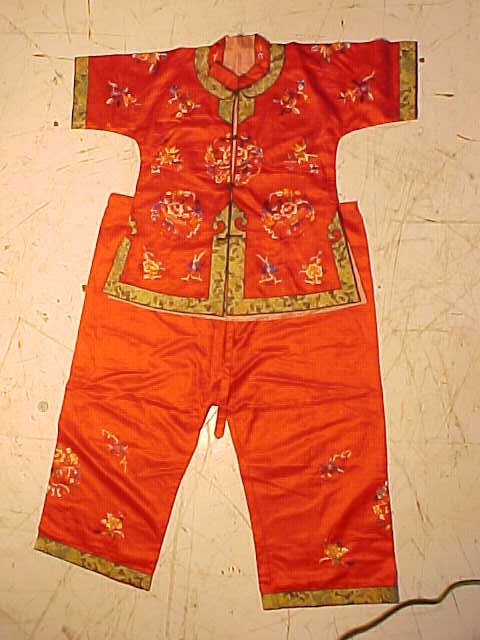 Vintage Chinese child's shirt & pants: Chinese child's shirt & pants, silk embroidered, red. Note, all clothing is vintage and has varying degrees of stains, wear & tears or other damage, all clothing articles are offered as is.