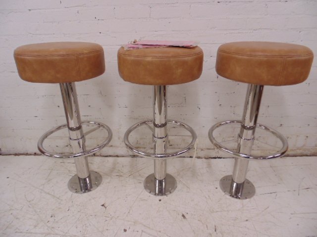 3 chrome deck stools from the Wolf of Wall St yacht set: Lot of 3 chrome deck stools, from the Naomi yacht set. Dimensions: 32" tall Condition: very good Provenance: Prop/Set Design from The Wolf of Wall Street Academy Award nominated Movie