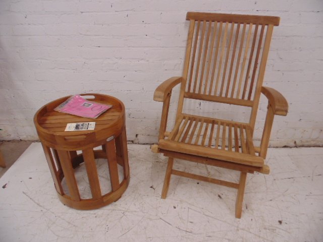 Teak folding chair & table frm Wolf of Wall St set: Outdoor classics teak folding chair with Westminster Katelonia side table Condition: good, small crack in side table lift off tray. Provenance: Prop/Set Design from The Wolf of Wall Street Academy Awa