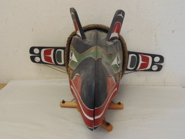 Pacific NW mask, Raven Transformation, Kwa-Gulth: Pacific North-West Coast mask, Raven Transformation, by Kwa-Gulth. Condition: Mask is in good condition , ropes allow the beak to be opened up, once opened a face can be seen inside, paint decorated i