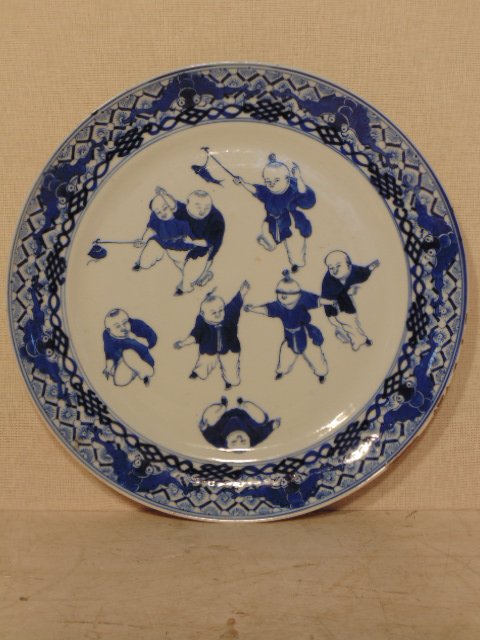 Chinese porcelain Blue & White plate, children: Chinese porcelain plate, children playing Dimensions: 9.5" in diameter Condition: unsigned, minor chips on edge. Provenance: National Art Club, Gramercy Park, NYC, New York, Note: All items are sold "