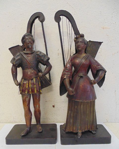 Pair early18th cent. polychrome figural tole planters: Pair early polychrome figural tole planters, original paint good overall condition 17.25" tall scew mounted on wooden bases wire damage and loss to both 'harps' Note, all property herein offered for s