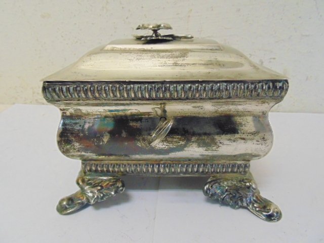 Silver Etrog box, floral finial, with key: Silver etrog box, floral finial, with key, 10.6 oz, 5.75" byn 4.25", 4.5" tall, lock works. Note, all property herein offered for sale is strictly "as is", and it is the bidder's responsibility, wheth