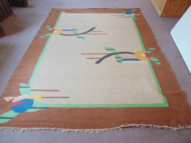 Drugget, British India rug, floral decorated: Drugget, British India rug, floral decorated, 9' by 12', in good condition, no damage or stains. Note, all property herein offered for sale is strictly "as is", and it is the bidder's responsibility,