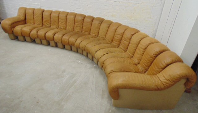 19 elements DS 600 Stendig tan leather sectional sofa: 19 elements DS 600 Stendig tan leather sectional sofa, some magic marker stains, one zipper broken. Note, all property herein offered for sale is strictly "as is", and it is the bidder's responsibilit