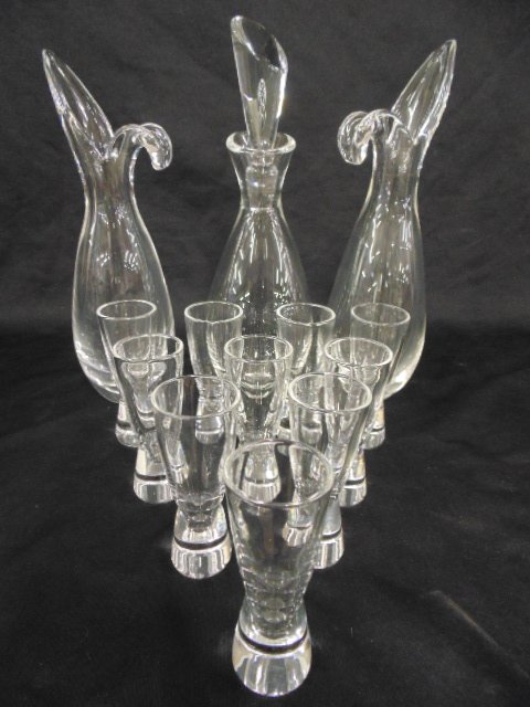 Lot Steuben, 3 decanters (1 with stopper) & 10 shot: Lot Steuben, 3 decanters (1 with stopper) & 10 shot glasses, glasses are 4", decanters are 10.25" & 11.25", in good condition