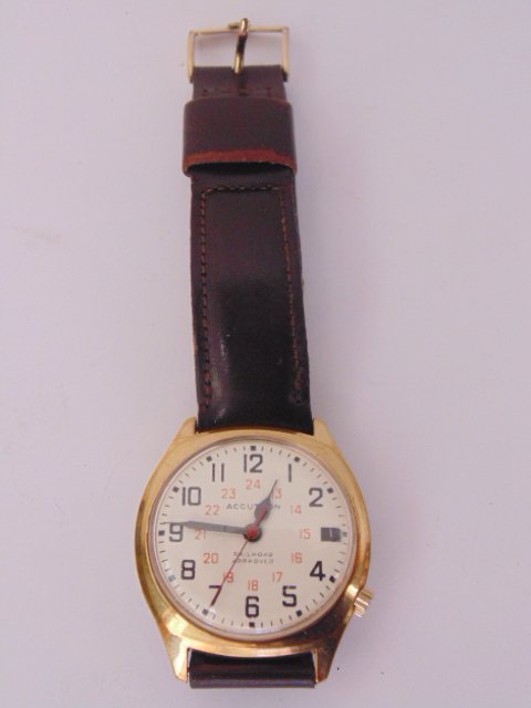 Wristwatch, "Accutron", railroad approved, by Bulova: Wristwatch, "Accutron", railroad approved, by Bulova, 10K rolled gold back plate, leather strap, works, strap worn.
