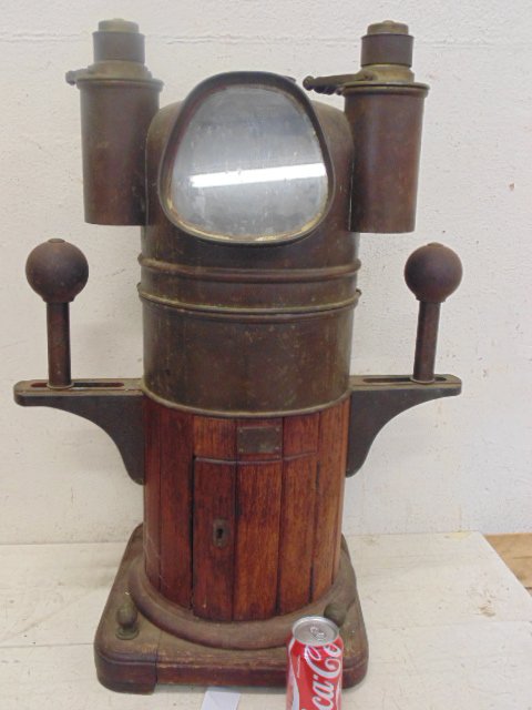 Binnacle, oak & metal, no compass, Joh. Gulbransen,: Binnacle, oak & metal, no compass, Joh. Gulbransen, Oslo, , weathered appearance, finish worn, some dents in copper parts, no compass, base is 14" by 14", height is 31.5". Please refer to images for g