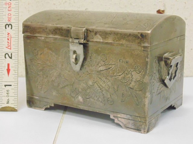 Russian silver Havdalah spice box, 9.3 troy: Russian silver Havdalah spice box, 9.3 troy, many hallmarks, 4 5/8" by 3" by 3.25", decorated with flowers, bottom hallmark shows "A.P.1890, 84, and figure on horse. Please refer to images for general