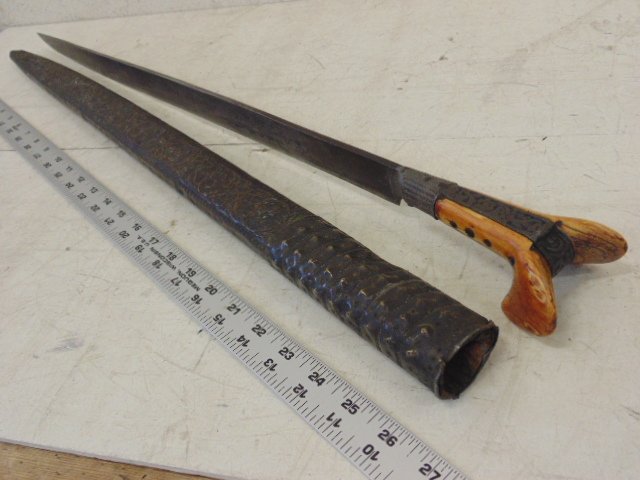 Early sword with bone handle, Persian writing: Early sword with bone handle, Persian writing on blade, blade is 23" long, total length is 28", some chips of bone handle