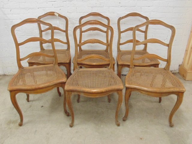Set 6 antique French provincial caned seat chairs: Set 6 antique French provincial caned seat chairs, some joints are a bit loose, caning in good condition, each chair is 20" wide, 17.5" deep (seat), height is 37", some old repairs visible. Please ref