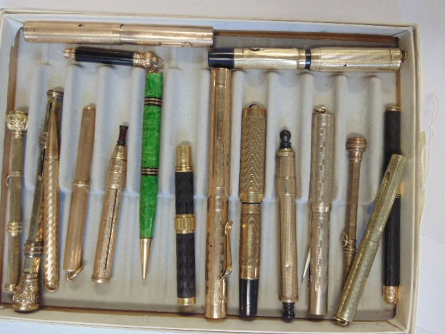 Lot of 17 gold filled & gold pencils & fountain pen,: Lot of 17 gold filled & gold pencils & fountain pen (at least one 14K), including Morrison's, these pens came from a massive single collection and are in as found condition, some are chipped or cracke