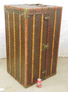 Louis Vuitton steamer trunk: Louis Vuitton steamer trunk, fitted original interior with 6 drawers on one side, wardrobe with hangers on other side, interior in excellent condition, some blemishes on exterior, one leather strap to