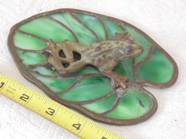 Bronze frog glass Lilly pad, Reading Hardware Company: Bronze frog on leaded glass Lilly pad, paperweight, sgd. RHC Co. (Reading Hardware Company) , one glass panel cracked, other has fine hairline, base is 6.25" by 4.25"