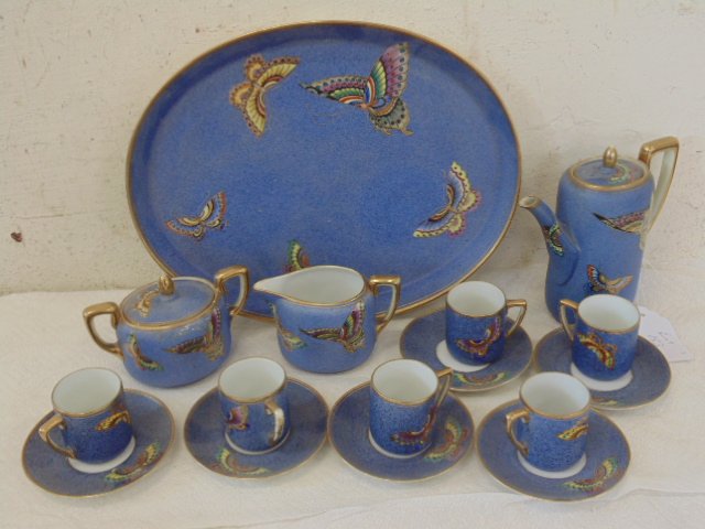 Nippon porcelain tea set: Nippon porcelain tea set, blue gilt, with butterfly decoration, tray is 12.75" by 10"