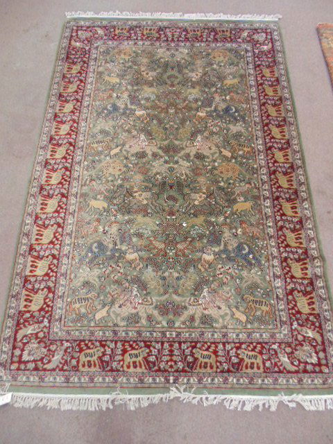 Indian carpet with hunt scenes, figures (1 of 9)