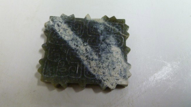 Green Jade "Magic" PLAQUE: Western Zhou Period, this Plaque features a zigzag edge, bevel-carvings and incised line designs. Such a complex piece is usually for a magic function, and the mystical designs present and absence of 