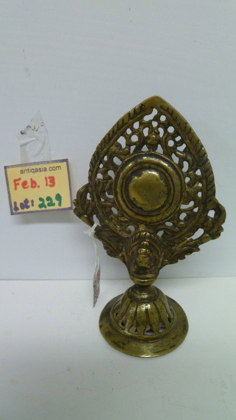 Bronze BUDDHIST MIRROR: Faithfully reflecting all objects, the mirror in Buddhism is a means and symbol of improving and purifying oneself - while moving along the path to wisdom and perfection. 18/19th C. Nepal, this one sh