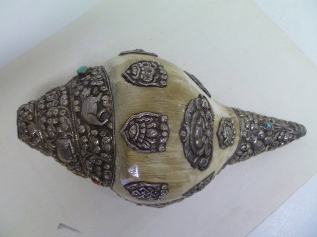 Large Buddhist SHELL TRUMPET: Inset with Turquoise and dark red Carnelian stones, the Tibetan Silverwork is exceptional and in good condition, and likely early-mid 20thC….though the shell and its use as a trumpet (sounds great a