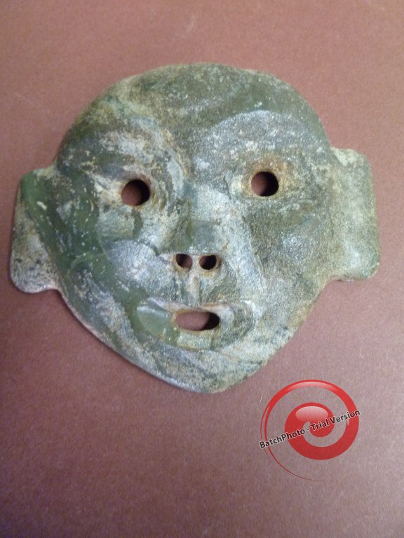 Small JADE NORTHEAST MASK - of "WONDER": All old stone-culture masks in China are rare, and this one equally so. Late Neolithic to Shang period, the roundish face is NOT a typical Chinese one but may be ancestral Northern Yueshi (Caucasian p