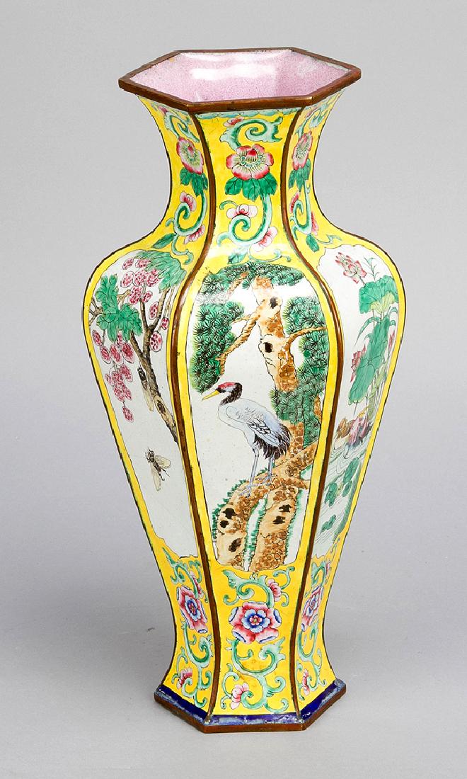 Chinese enamel vase: Chinese enamel vase, round canted shape, with six reserves on yellow ground, with flowers and animals painted; rich floral decorations; copper borders, thin neck; inside pink enamel; Canton 19th Centu