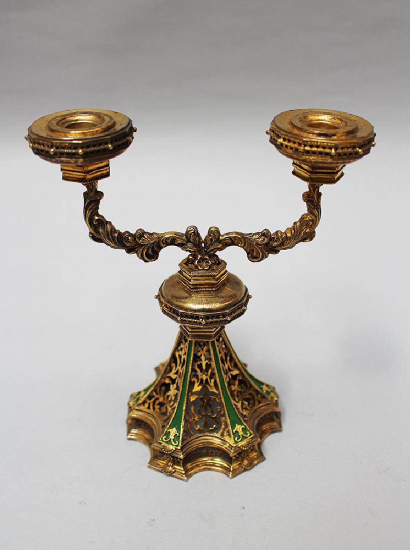 Small silver Candelabra: Small silver Candelabra, on waved, concave base with open work and enamel decorations, two floral branches with two spouts. richly decorated and gilted, marked on the base, possibly Hungarian late 19t