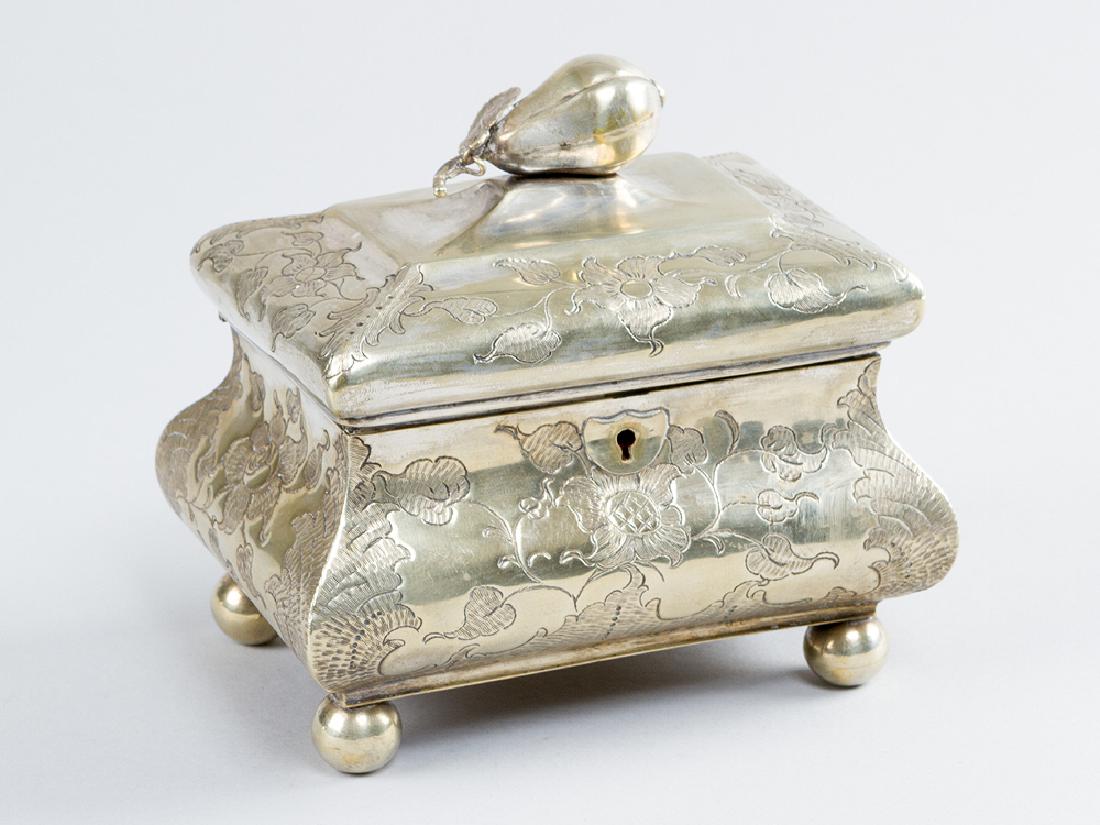 St. Petersburg Silver Box: St. Petersburg Silver Box, on four feet, rectangular shape with one lid and rich engraved flowers, on top pear, inside gilded with lock and silver stamp of Zlotnik 88. Late 19th Century. 450 gram.