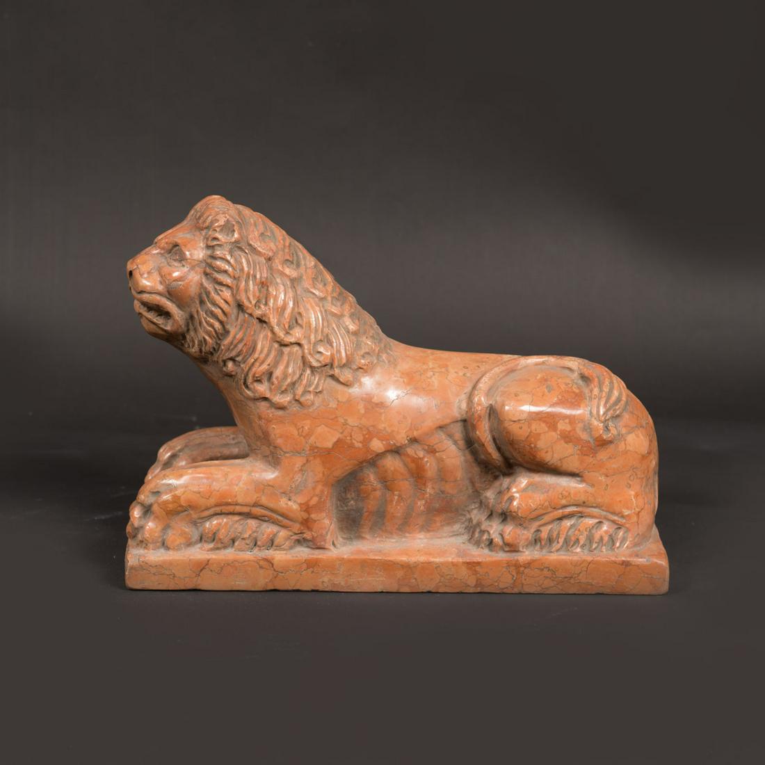 Pair of Romanesque Lions: Pair of Romanesque Lions, in lying position, on integrated bases, Rosso Verona marble with white and grey veins, a pair, each 33 x 24 cm
