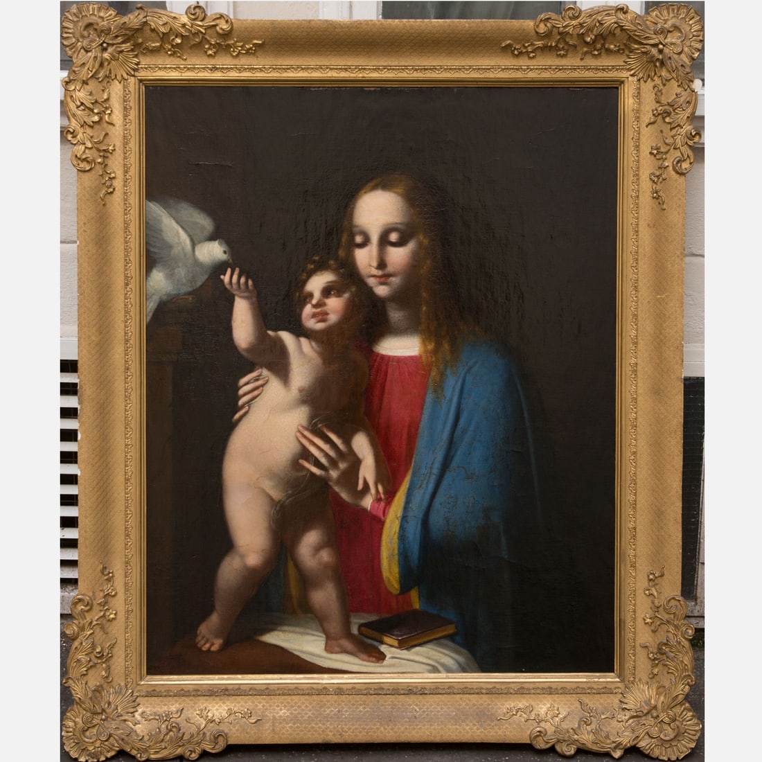 Bernardino Luini (1480 – 1532) – Follower: Bernardino Luini (1480 -1532) - Follower, Madonna with child and bird, oil on canvas, in a 19th century gilded frame, 90 x 72 cm.