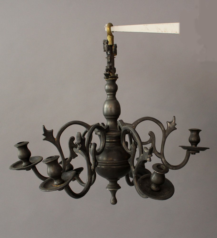 Small pewter chandlier with six branches and spouts,: Small pewter chandlier with six branches and spouts, with open work decorations and volutes, stepped and shaped round and bowed middle string with double eagle on top, ending in a bronze hook; possibl