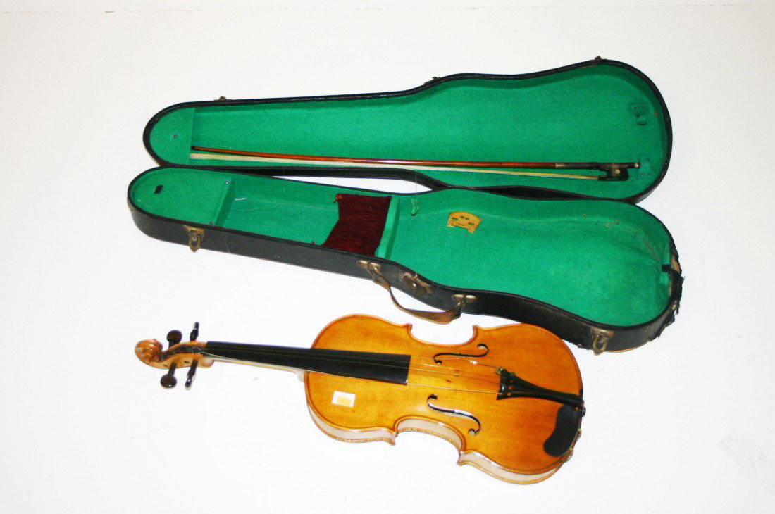 A very good Violin, by Wolff Bros, with original : A very good Violin, by Wolff Bros, with original inside label No: 672, and dated 1887, the two piece maple back with fine string inlay, together with a bow indistinctly signed, cased, 23 1/2" (597mm) 