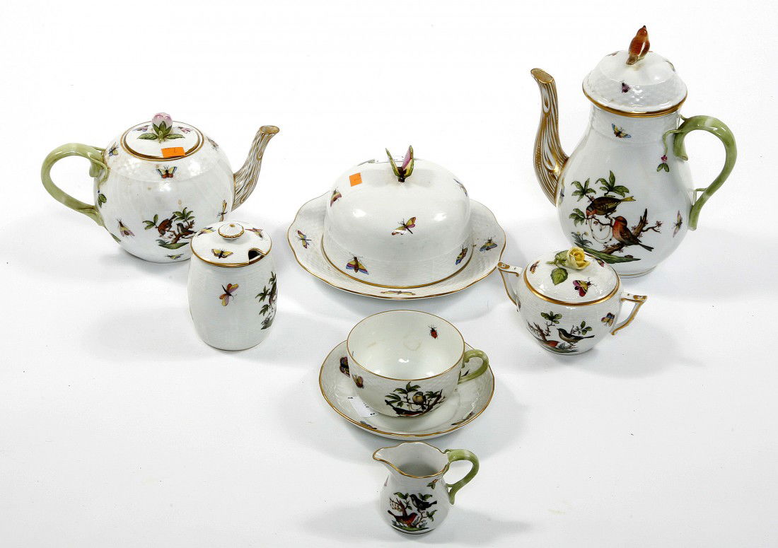 A 28 piece colourful part Herand hand painted porc: A 28 piece colourful part Herand hand painted porcelain Tea / Coffee Service, comprising five cups, five saucers, a milk and cream jug, a sucrier and cover, a large butter cooler and cover, a pear sha