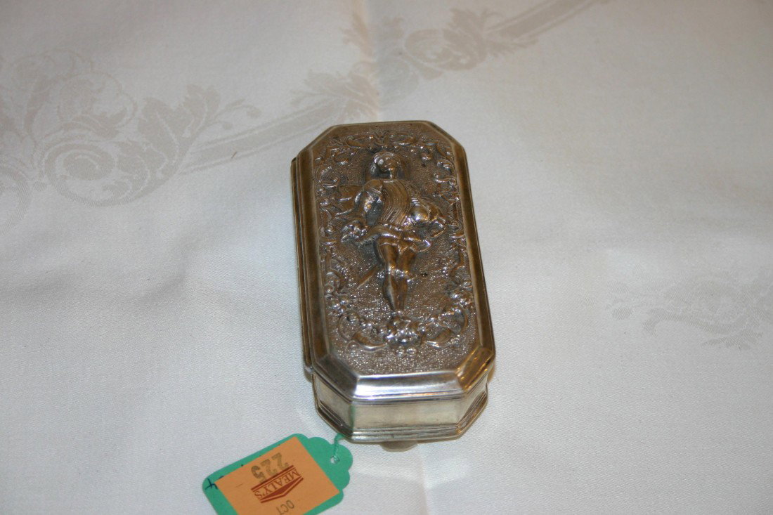 A heavy rectangular silver and silver gilt Snuff B: A heavy rectangular silver and silver gilt Snuff Box, Dutch 18th Century, the cover chased with scrolling foliage around the figure of a man holding a decanter, the frieze with various crests, 5" (13c