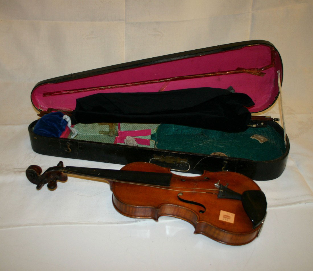 A Wolff Bros. Violin, # 939, 1891, labelled, 14" (: A Wolff Bros. Violin, # 939, 1891, labelled, 14" (36cms) back, in case with two old bows. (1)