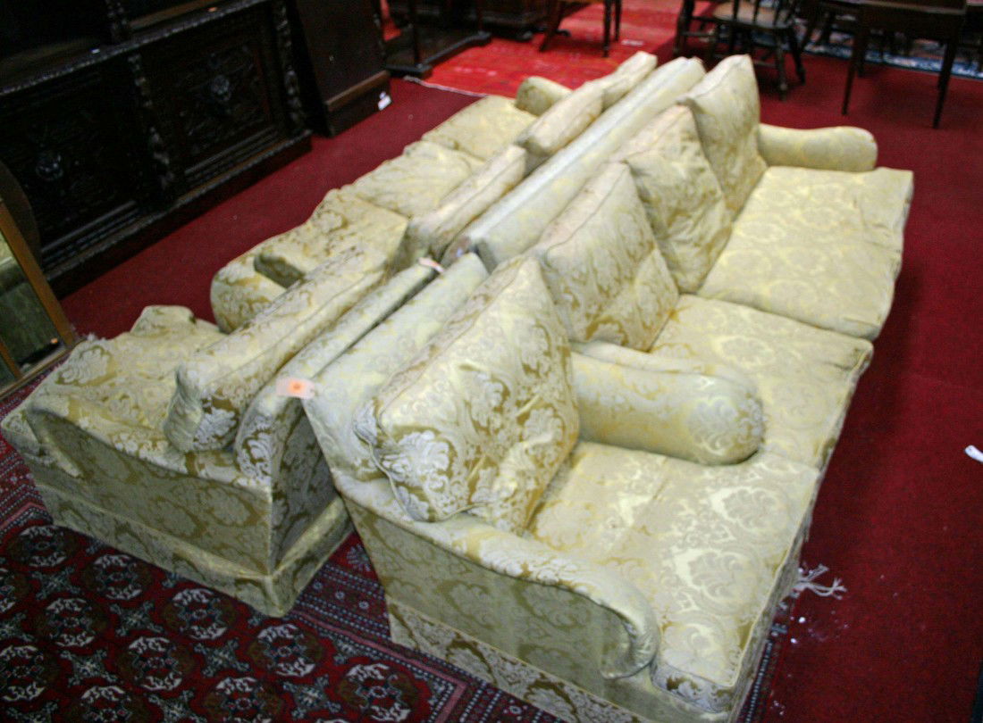 A four piece Suite of Seat Furniture, modern, comp: A four piece Suite of Seat Furniture, modern, comprising a pair of four seater Settees, each with loose cushions covered in gild self print fabric and a pair of matching Easy Armchairs. (4)