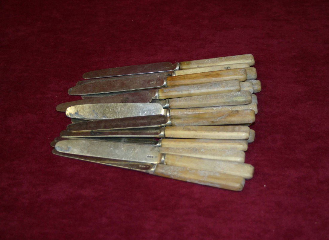 Eighteen bone handled silver Supper Knives, George: Eighteen bone handled silver Supper Knives, George III by John Thompson, London 1810, some of the handles with the crest of Dukes of Ormonde. (18)