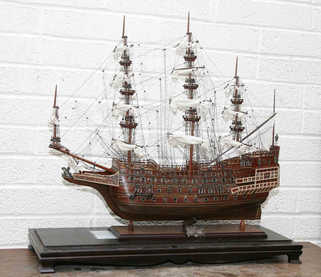 A large cased scale model of H.M.S. Sovereign of t: A large cased scale model of H.M.S. Sovereign of the Seas, the 17th centuury British Royal 1st rate ship of the line of 100 guns, later known as just 'Sovereign' and then 'Royal Sovereign', in wooden