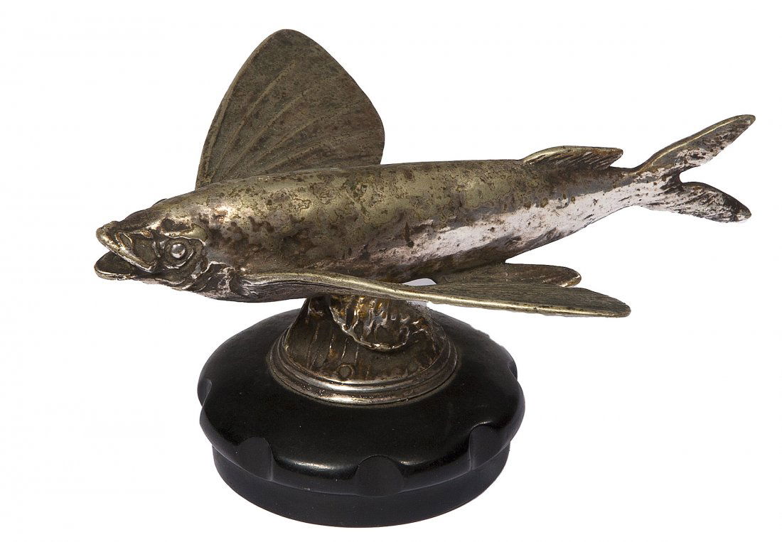A rare silver plated automobile radiator cap car m: A rare silver plated automobile radiator cap car mascot, modelled as a flying fish, 6" (15cms). (1).