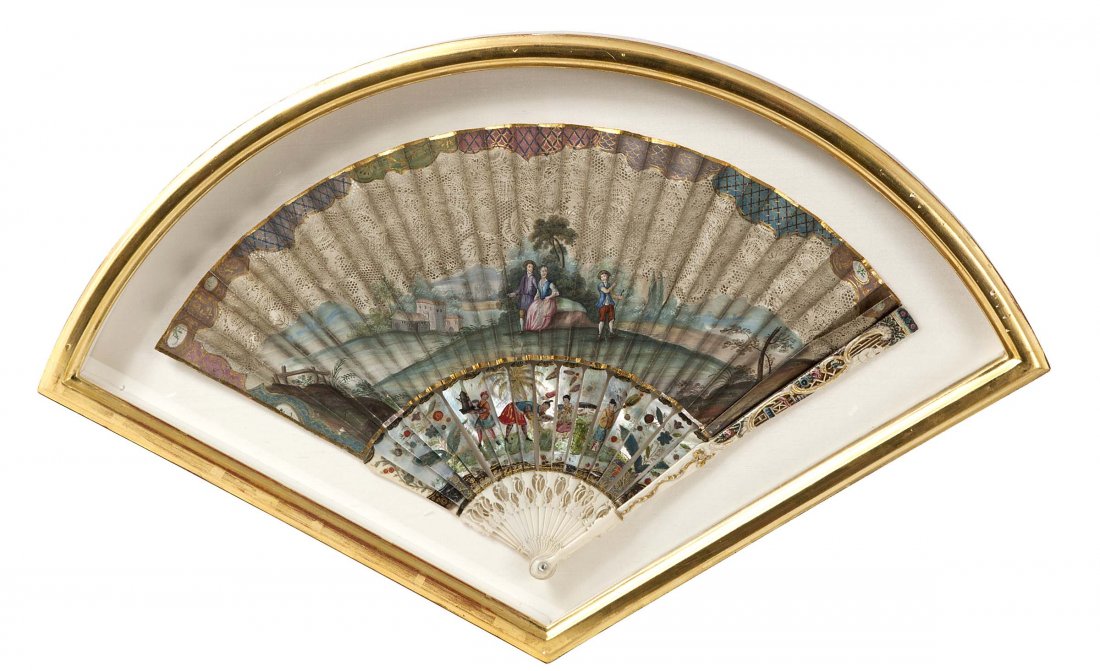 18TH CENTURY CONTINENTAL SCHOOL: 18TH CENTURY CONTINENTAL SCHOOLA painted fan depicting shepherd and shepherdess conversing with another figure in a landscape, gouache on painted ivory sticks, the leaf finely pierced, the sticks with