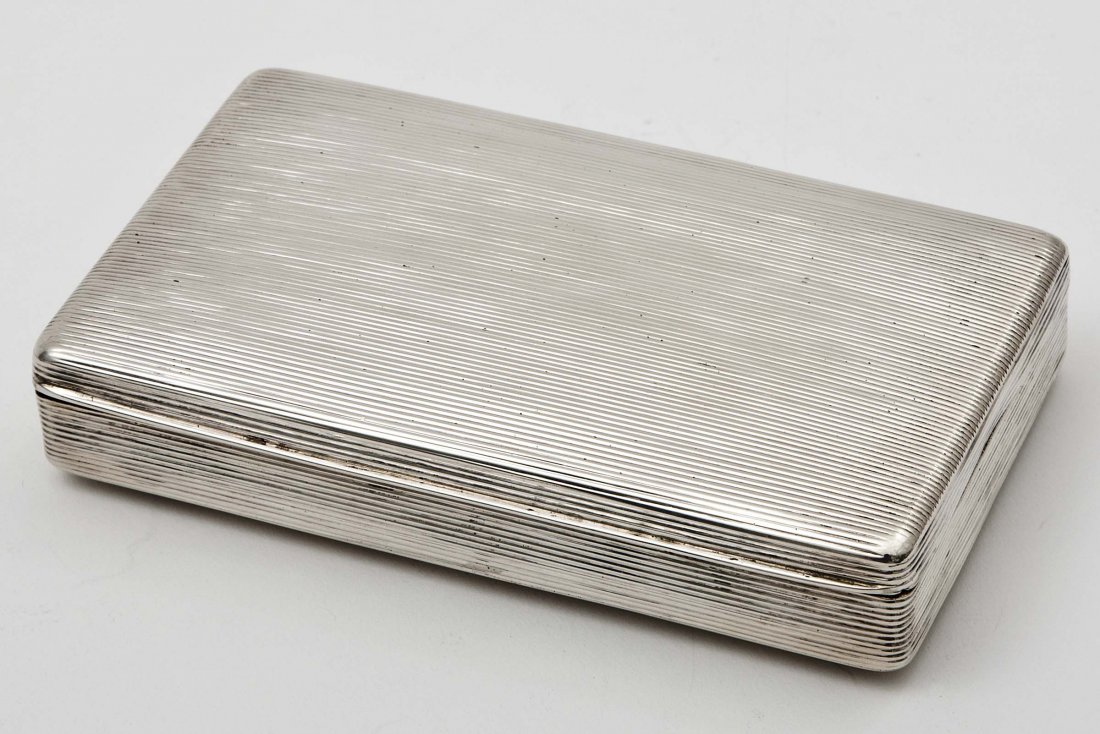 A rectangular Dutch silver Cigarette Box,: A rectangular Dutch silver Cigarette Box,19th Century,engraved with a tavern scene after David Tenniers, inscribed May Fest 1745 (lacking two feet) 5 1/4" (13.5cms), and another rectangular Dutch Box,