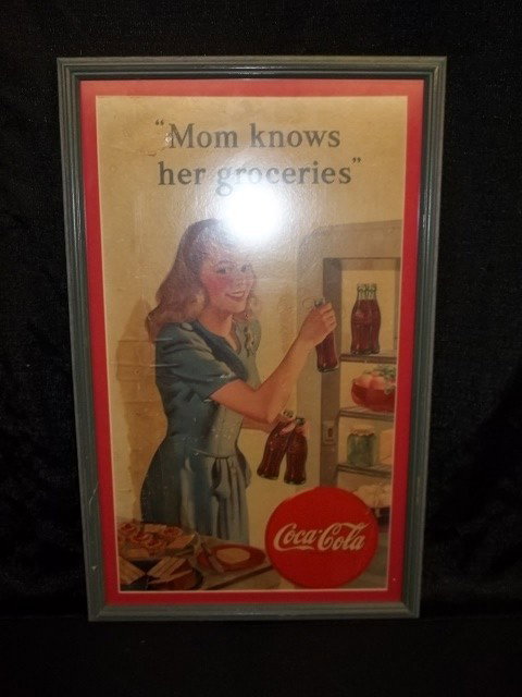 Antique Coca-Cola Advertising Sign 1950's: Antique Coca-cola advertising sign from the 50's. Measures 29 x 18 framed and matted, and has a few tears and some water damage.
