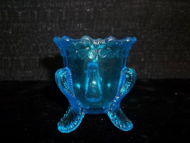 Blue pressed glass toothpick holder: Blue pressed glass toothpick holder