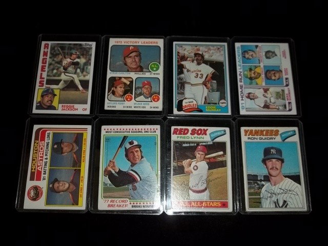 8 Card 1977+ Topps Lot Nolan Ryan: 8 Topps Cards, 1977 and up with stars such as Nolan Ryan, Robinson, and Schmidt.