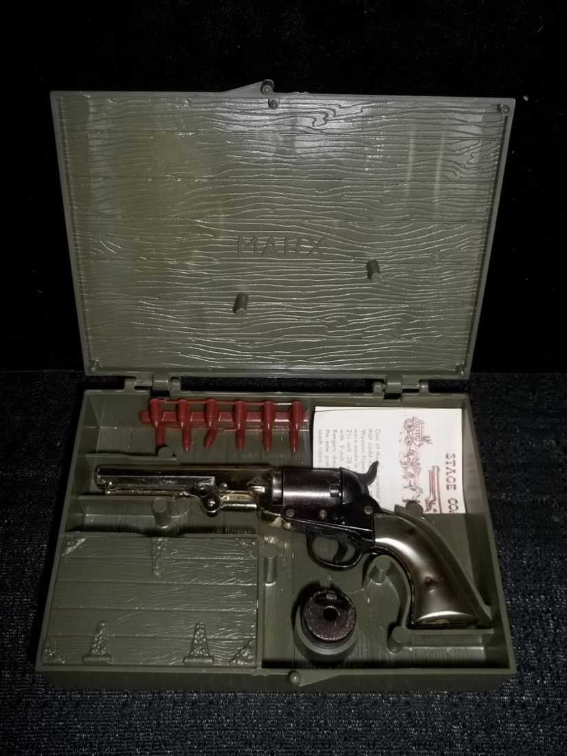 MINT Marx Stagecoach Pistol COMPLETE: Beautiful, mint condition marx stagecoach pistol in the plastic box, with unused bullets, extra cylinder, and caps in box with instructions, in amazing condition. Super rare to find one like this.