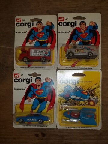Lot of 4 Vintage Corgi Superman Cars In Package: Lot of 4 vintage 1978-79 Corgi Superman vehicles in the package. You get 1 #11 supermobile, 1 #17 metropolis police cruiser, 1 #47 silver van, and 1 #50 Daily Planet Delivery Van. All are in the pack.