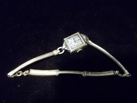 10k Rolled Gold Old Gruen Watch: 10k rolled gold plated ladies gruen old watch, 12k gold filled band, 10k rolled gold housing, not sure if it works.