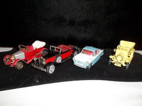 Corgi & Lesney Lot of 4 Cars: Corgi & Lesney lot of 4 cars triumph herald, 1904 spyker, 1930 packard victoria, 1914 prince henry vaux hall, these cars are missing parts, damaged, etc…